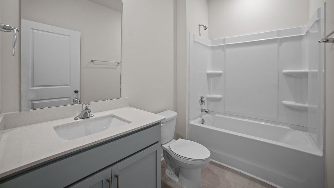 Furnished interior view inside a new home in Ridgewood Farms, Winterville (Image 9).