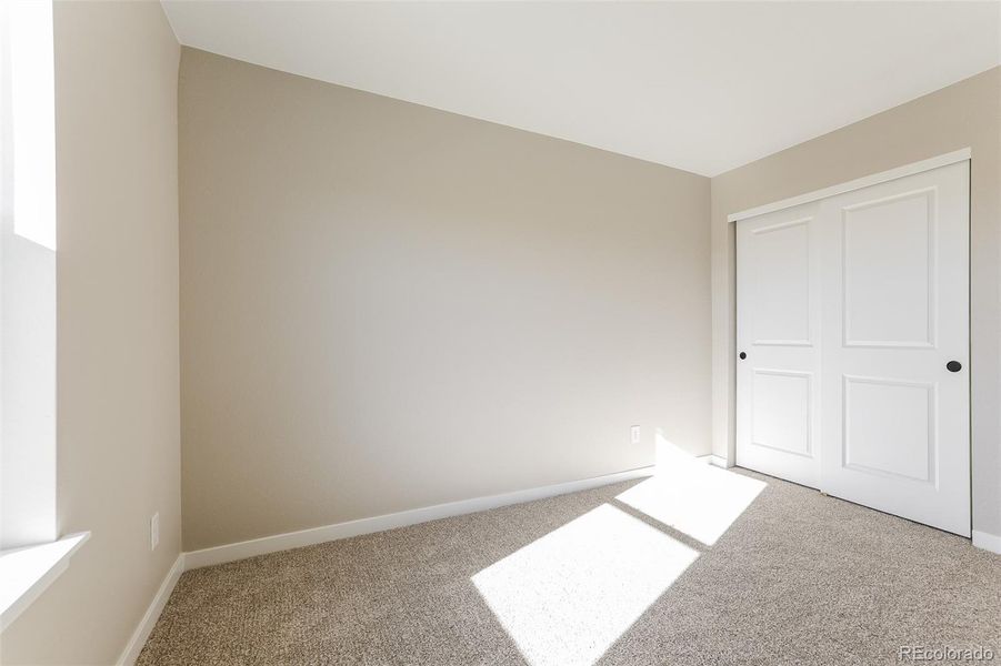 Spacious, unfurnished interior of a new home in Second Creek Farm, Commerce City (Image 8).