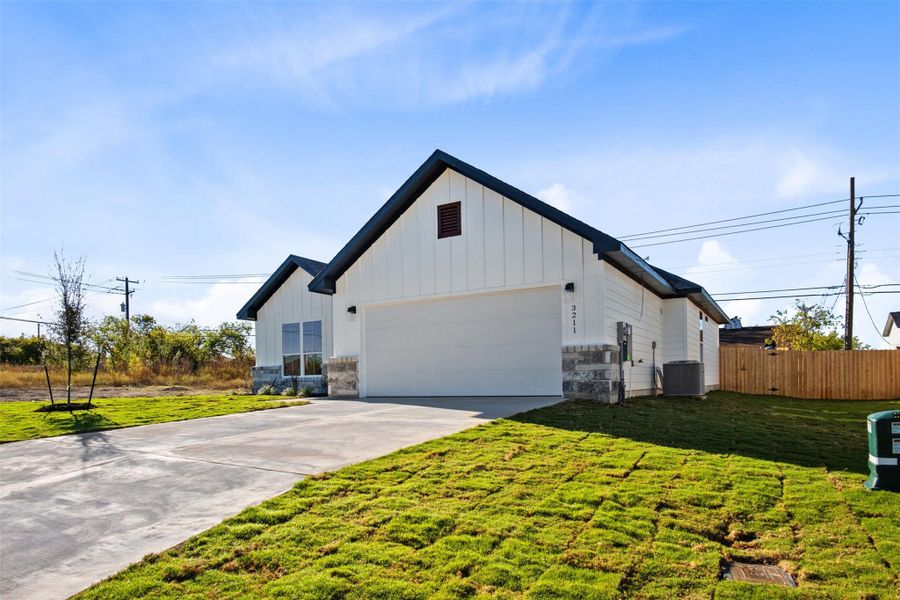 Front exterior of a new home in , Temple, TX, highlighting curb appeal (Image 14).