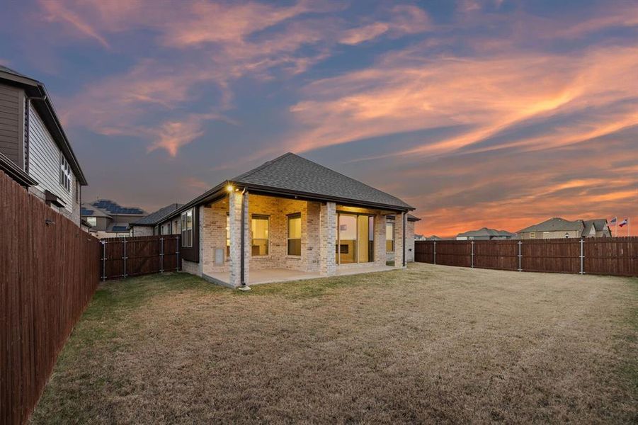 Exterior details and patio area of a home in Birdsong, Mansfield (Image 4).