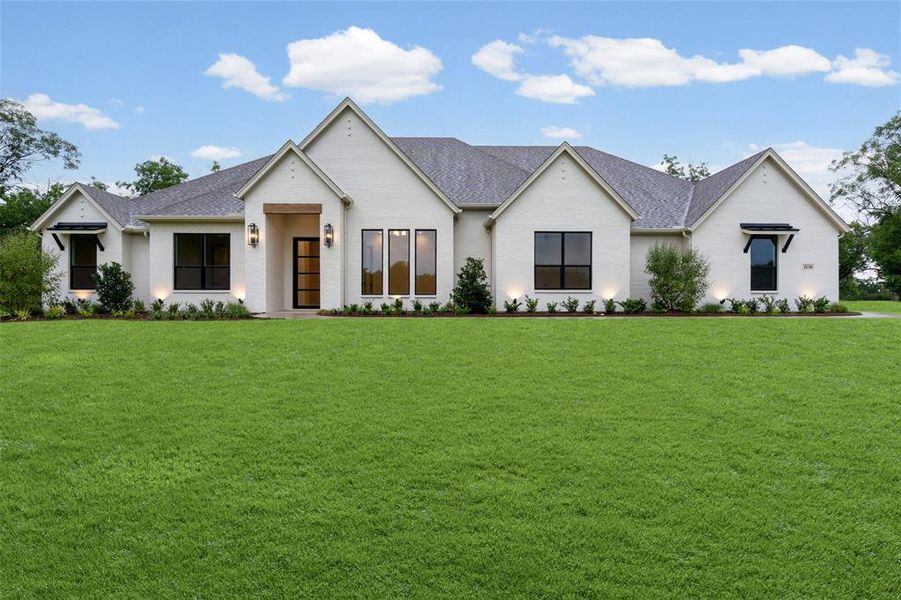 Front exterior of a new home in Pecan Plantation, Granbury, TX, highlighting curb appeal (Image 1). Front exterior of a new home in Pecan Plantation, Granbury, TX, highlighting curb appeal (Image 1).