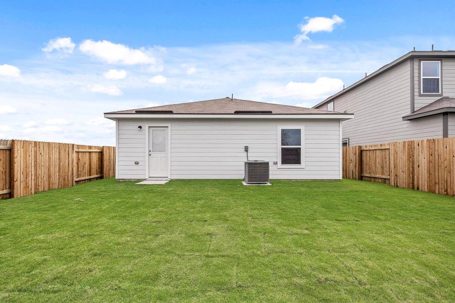Front exterior of a new home in , Elgin, TX, highlighting curb appeal (Image 1). Front exterior of a new home in , Elgin, TX, highlighting curb appeal (Image 1).