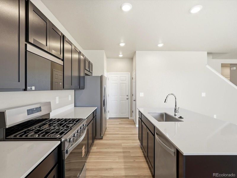 Furnished interior view inside a new home in Buffalo Highlands: The Flora Collection, Commerce City (Image 7).