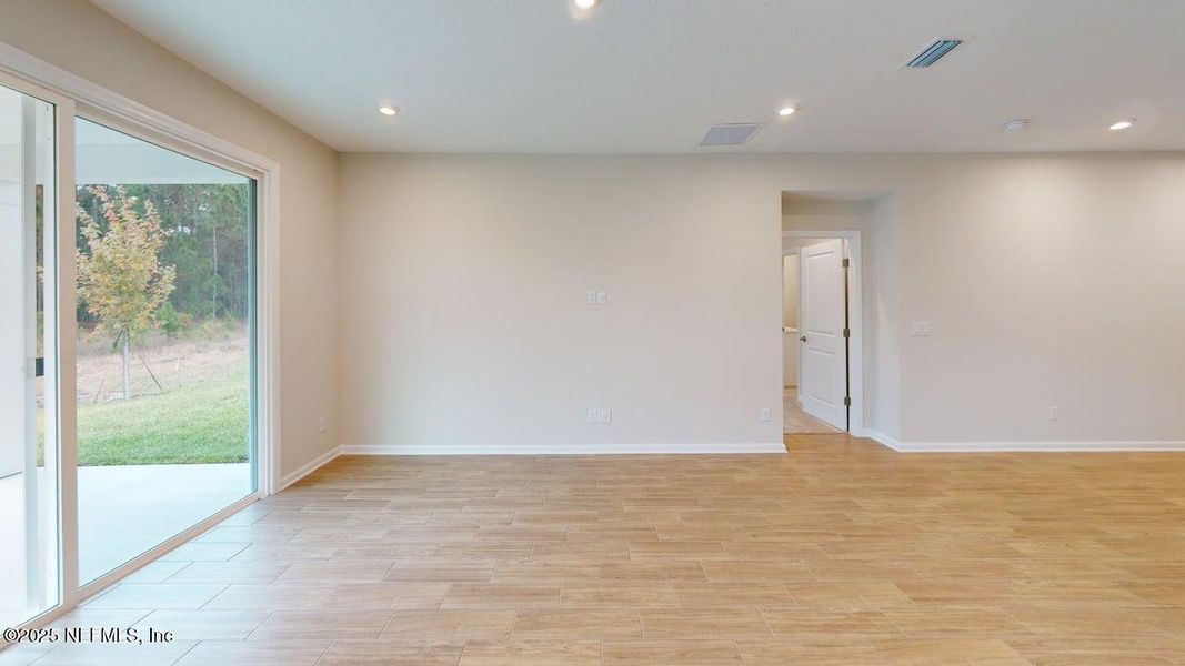 Spacious, unfurnished interior of a new home in Lakes at Bella Lago, Green Cove Springs (Image 9). Spacious, unfurnished interior of a new home in Lakes at Bella Lago, Green Cove Springs (Image 9).
