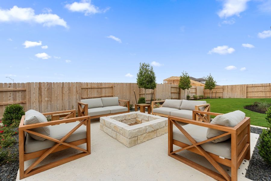 Exterior details and patio area of a home in Heritage, Dripping Springs (Image 29).