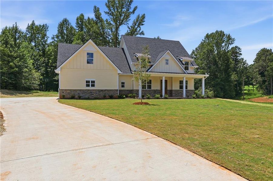 Front exterior of a new home in , Cornelia, GA, highlighting curb appeal (Image 27).