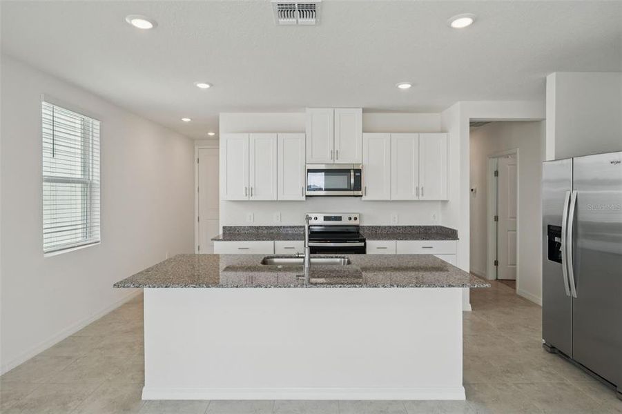 Furnished interior view inside a new home in Crosswinds - Classic Series, Haines City (Image 4).
