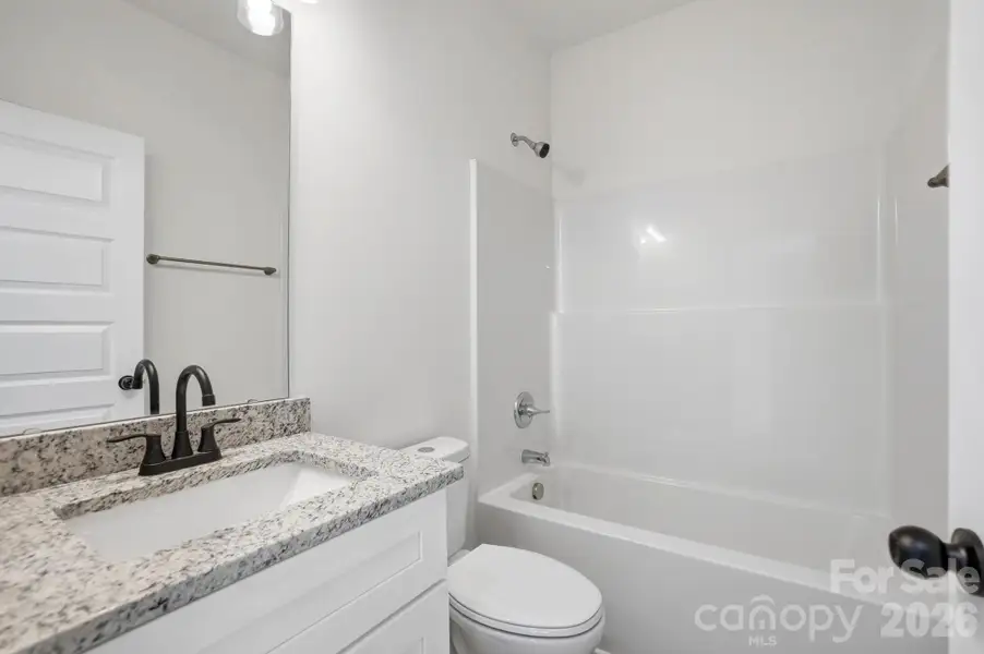 Furnished interior view inside a new home in , Wadesboro (Image 7).