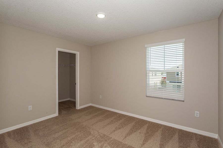 Spacious, unfurnished interior of a new home in Scenic Terrace, Haines City (Image 19).