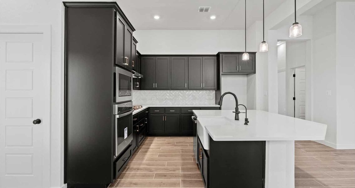 Representative furnished interior of a home built from the Rhyan by Chesmar Homes in Stream Waters, Seguin (Image 6). Representative furnished interior of a home built from the Rhyan by Chesmar Homes in Stream Waters, Seguin (Image 6).