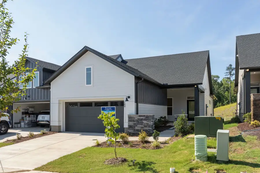 Front exterior of a new home in Encore at Chatham Park – Villa Series, Pittsboro, NC, highlighting curb appeal (Image 1). Front exterior of a new home in Encore at Chatham Park – Villa Series, Pittsboro, NC, highlighting curb appeal (Image 1).