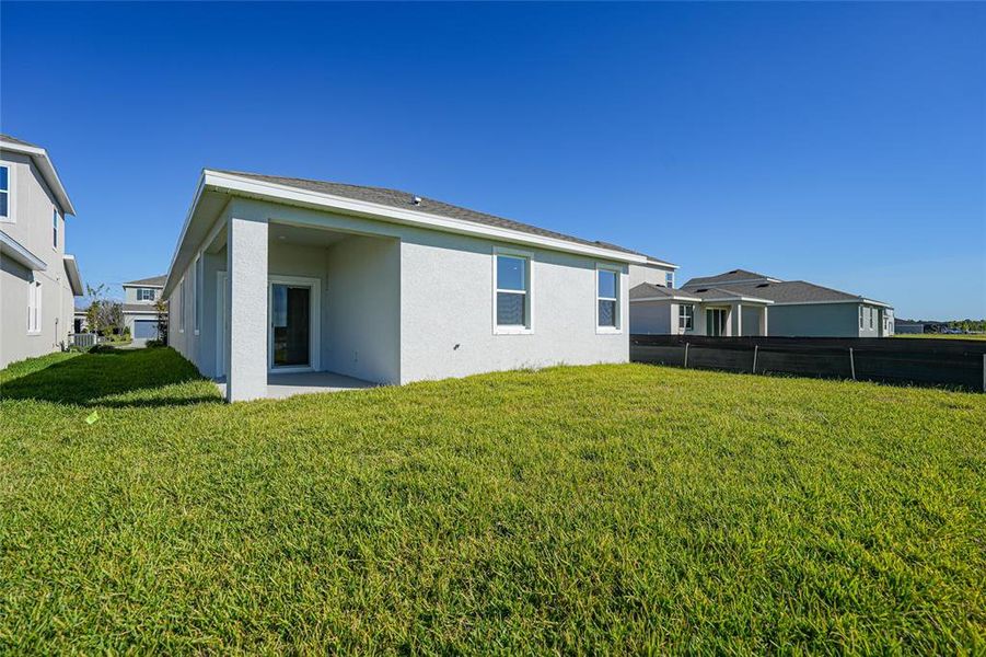 Exterior details and patio area of a home in Turnleaf, Punta Gorda (Image 4).