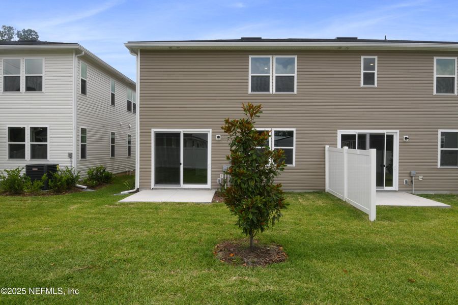Exterior details and patio area of a home in Seasons at Park Trace, Jacksonville (Image 3).