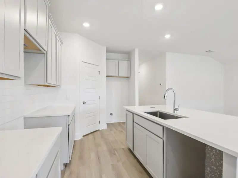 Kitchen in the Callaghan floorplan at a Meritage Homes community.