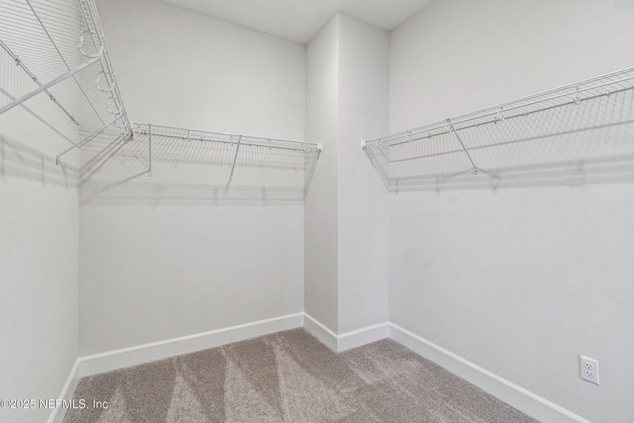 Spacious, unfurnished interior of a new home in Tributary 70', Yulee (Image 26).