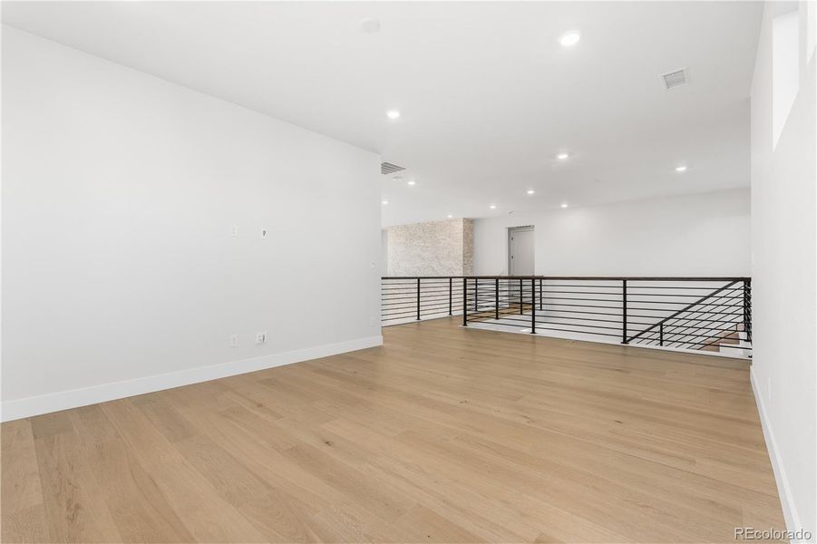 Spacious, unfurnished interior of a new home in Luxe at The Canyons, Castle Pines (Image 45).
