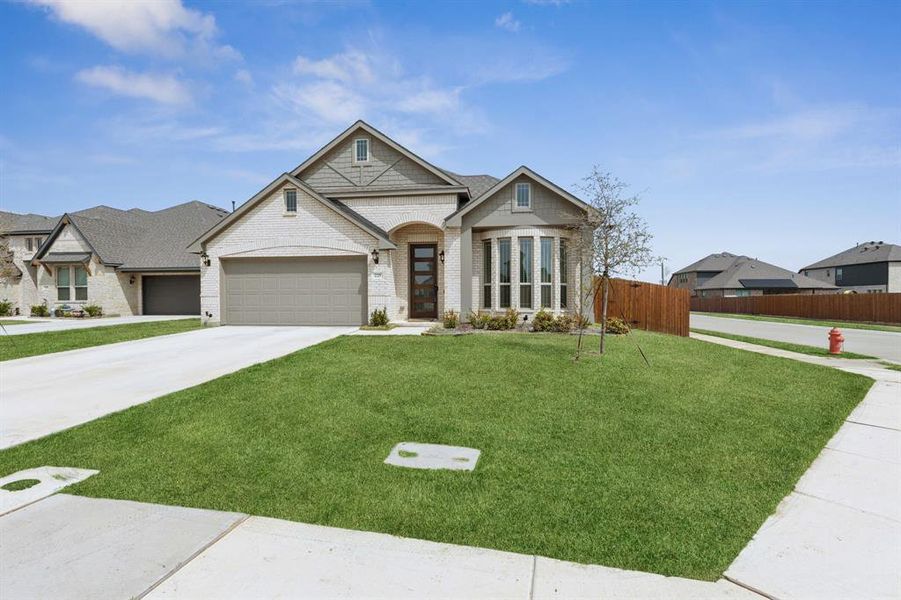 Front exterior of a new home in , Ponder, TX, highlighting curb appeal (Image 19). Front exterior of a new home in , Ponder, TX, highlighting curb appeal (Image 19).