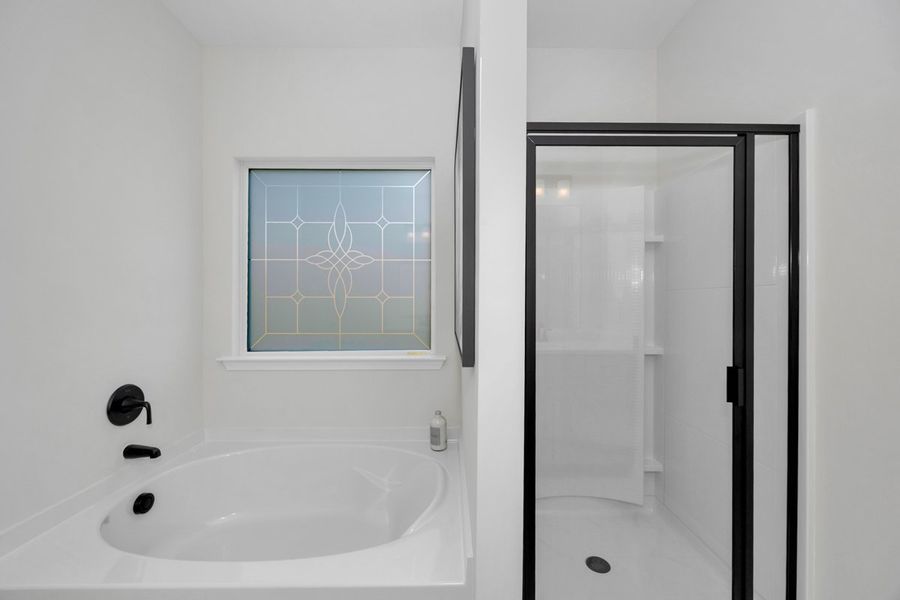 Representative interior finishes for a home built from the The Hampton by Smith Douglas Homes in La Segarra, Brookshire (Image 21).