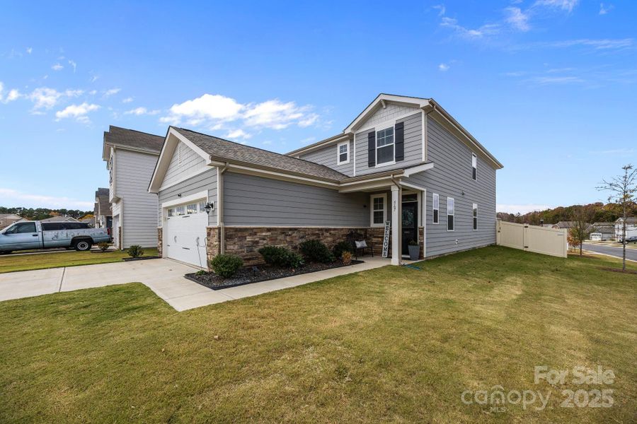 Front exterior of a new home in The Meadows at Asbury Ridge, York, SC, highlighting curb appeal (Image 2). Front exterior of a new home in The Meadows at Asbury Ridge, York, SC, highlighting curb appeal (Image 2).