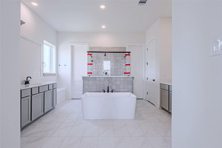 The open-concept floor plan flows seamlessly from the entry into the main living areas