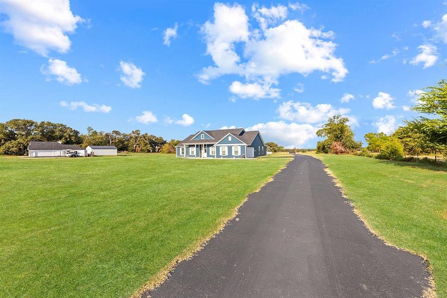 Front exterior of a new home in , Wills Point, TX, highlighting curb appeal (Image 2). Front exterior of a new home in , Wills Point, TX, highlighting curb appeal (Image 2).