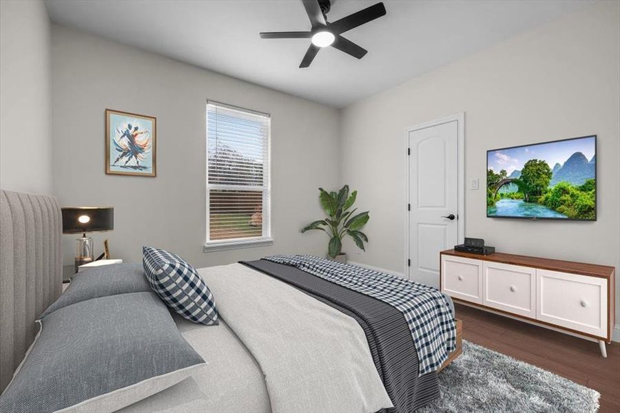 Bedroom with dark wood-type flooring and ceiling fan