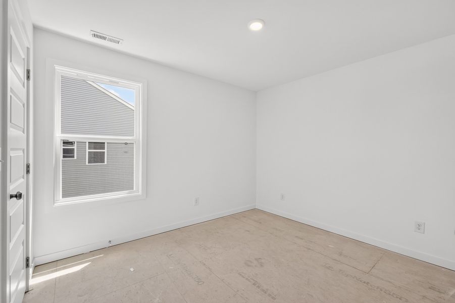 *Photo of actual home. Flooring selection to be installed.