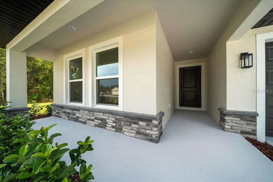 Exterior details and patio area of a home in , Brooksville (Image 33). Exterior details and patio area of a home in , Brooksville (Image 33).