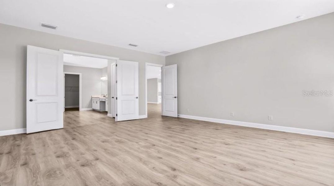 Spacious, unfurnished interior of a new home in Esplanade at Starling, Punta Gorda (Image 18). Spacious, unfurnished interior of a new home in Esplanade at Starling, Punta Gorda (Image 18).