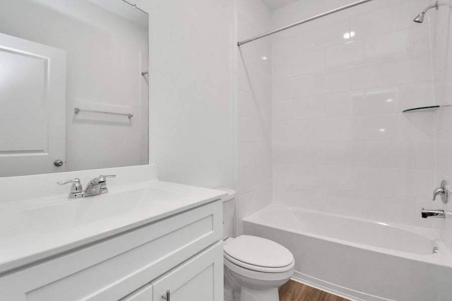 Furnished interior view inside a new home in Decker Farms, Magnolia (Image 12).