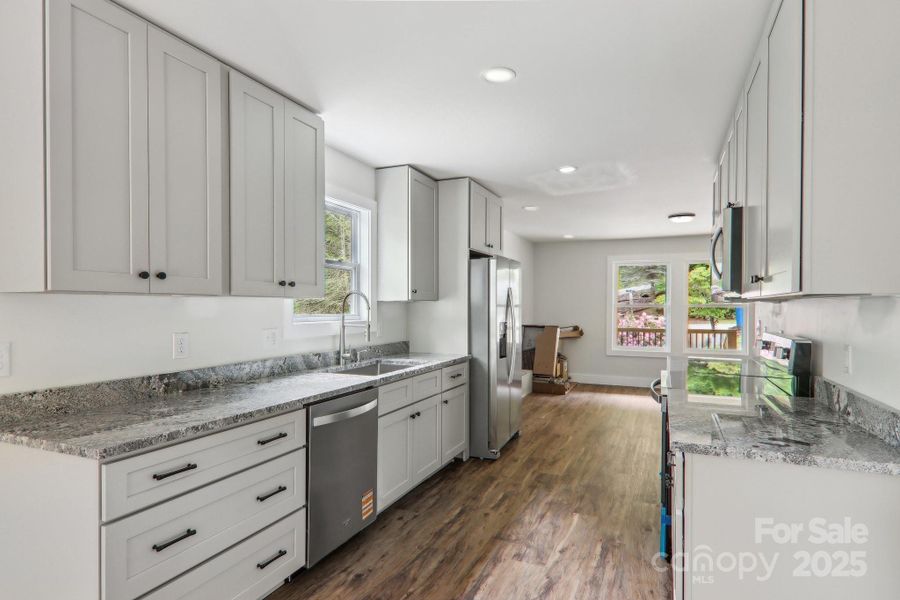 Furnished interior view inside a new home in , Waynesville (Image 15).