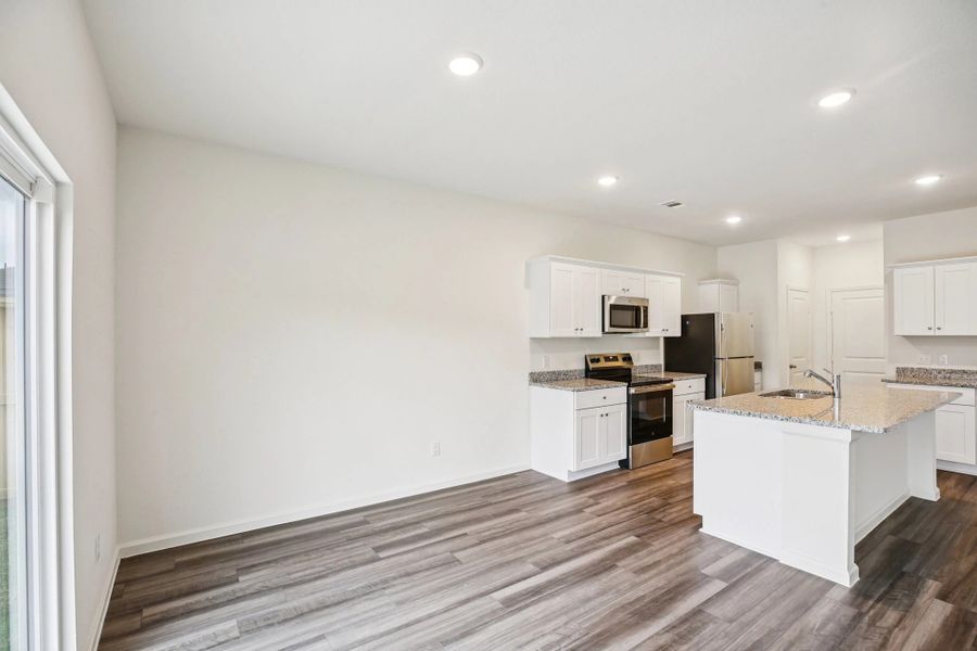 Representative furnished interior of a home built from the Discovery by Starlight Homes in Sunset Oaks, Maxwell (Image 6).
