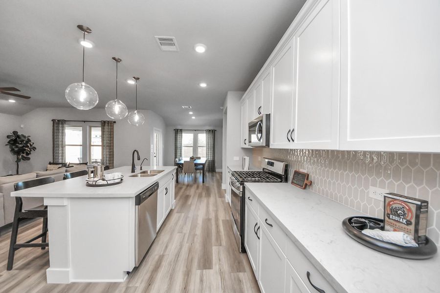 Furnished interior view inside a new home in Sunterra: Landmark Collection, Katy (Image 18).