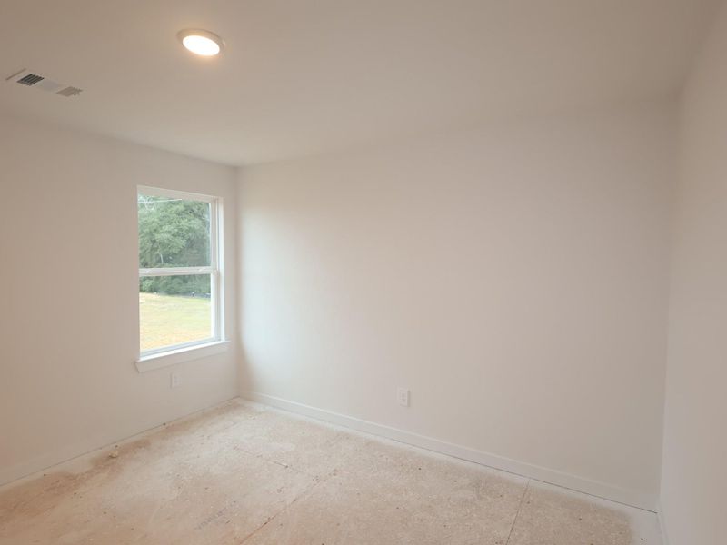 Spacious, unfurnished interior of a new home in Sorella, Tomball (Image 14).