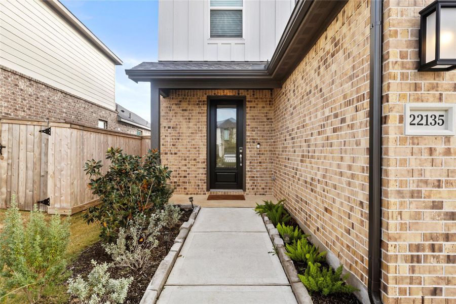 Exterior details and patio area of a home in Avalon at Cypress 40s, Cypress (Image 20).