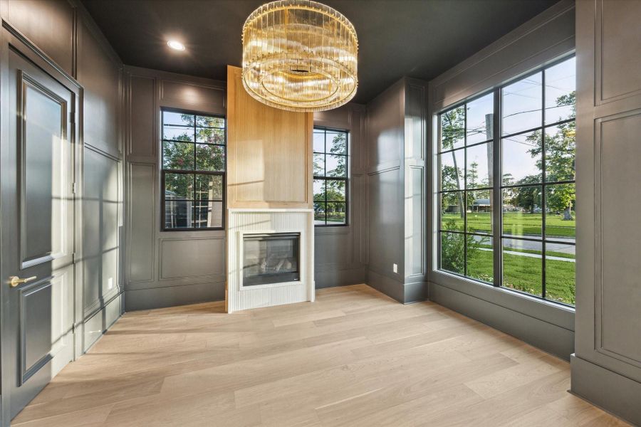 Elegant study with high end trim, fireplace *Picture is of a recently constructed home by the builder.  1519 Candlelight will be similar in quality, but these pictures are not meant to be an exact representation of the new home. Specs of home may change at sole discretion of the seller.