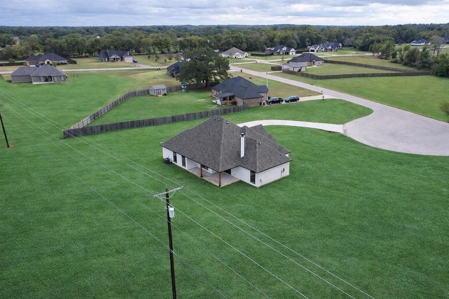 Front exterior of a new home in , Canton, TX, highlighting curb appeal (Image 1). Front exterior of a new home in , Canton, TX, highlighting curb appeal (Image 1).