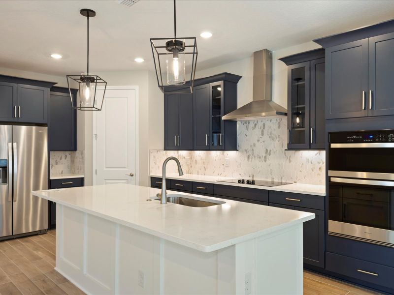 Kitchen in the Emillia floorplan at 360 Birkdale Dr