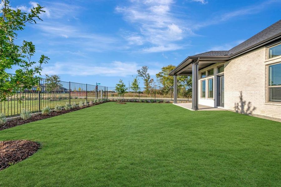Exterior details and patio area of a home in Mantua Point Classics, Van Alstyne (Image 2). Exterior details and patio area of a home in Mantua Point Classics, Van Alstyne (Image 2).