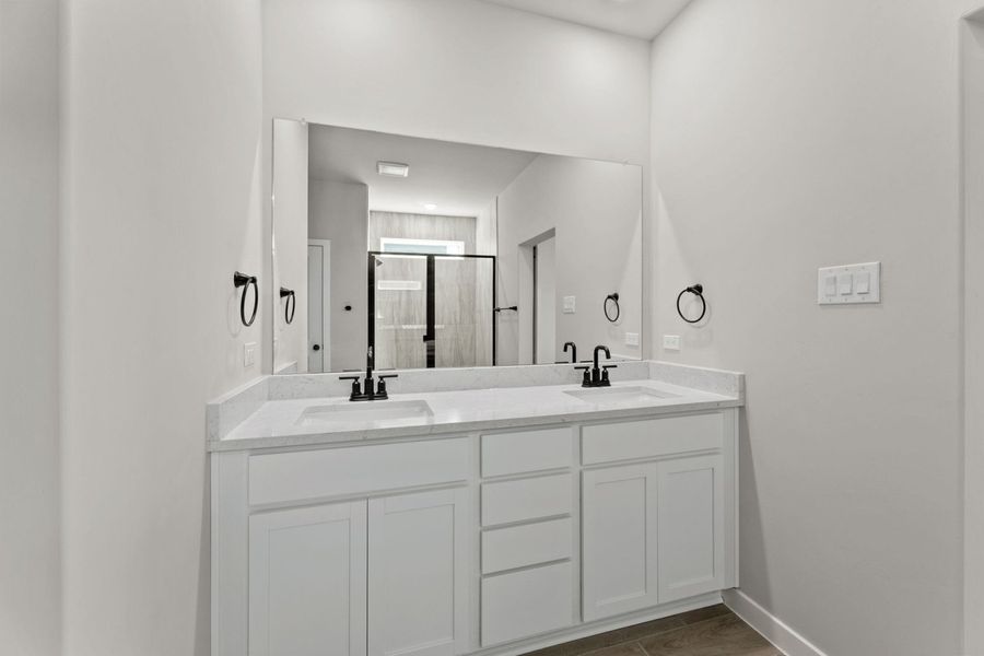 Representative furnished interior of a home built from the Tularosa by Hakes Brothers in Hickory Ridge, Elmendorf (Image 12).