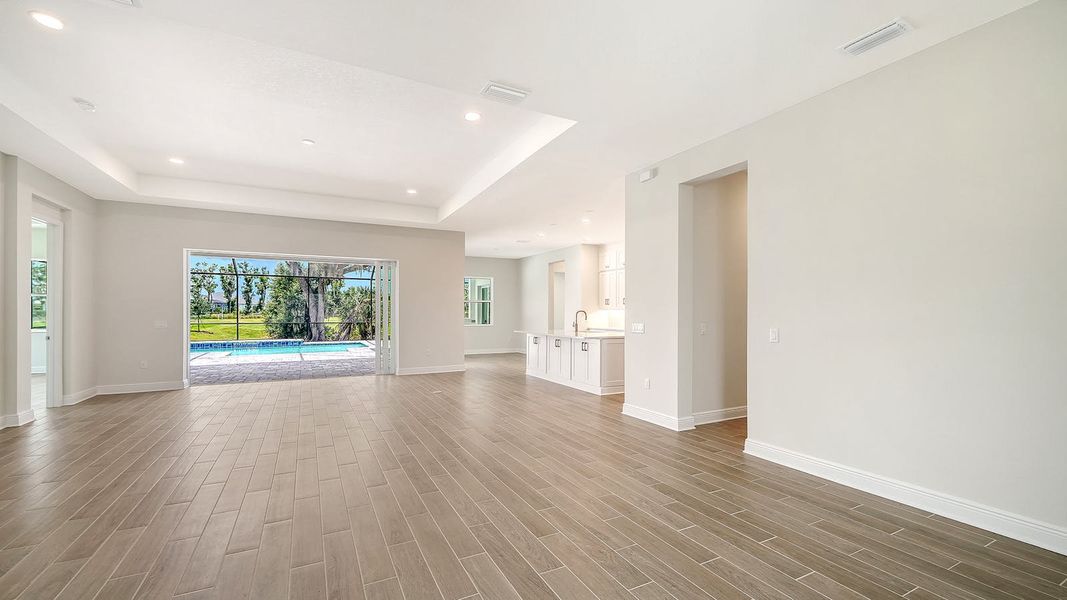 Spacious, unfurnished interior of a new home in Canoe Creek Real Estate and Homes for Sale in Parrish, FL - Neal Communities, Parrish (Image 34).