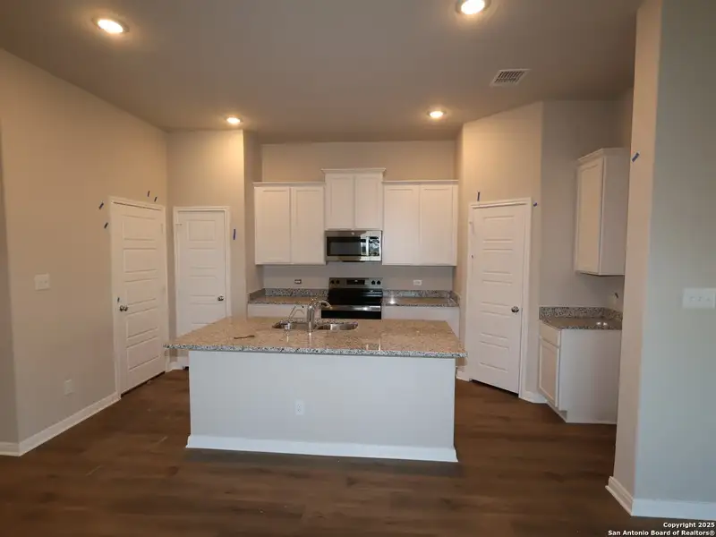 Furnished interior view inside a new home in Greenspoint Heights, Seguin (Image 6).