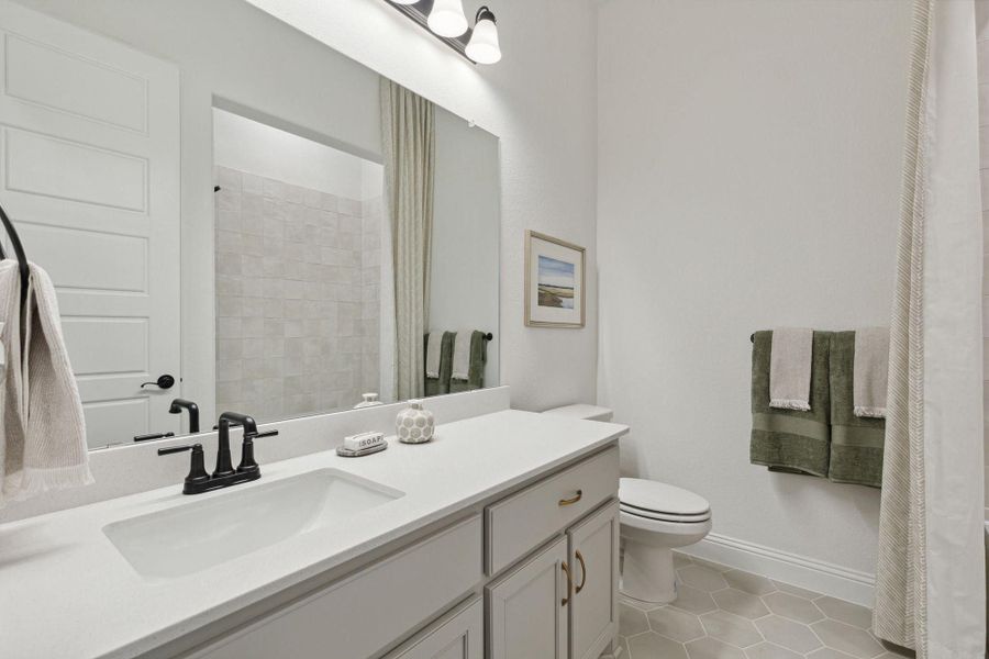 Bathroom | Concept 3441 at Hidden Creek Estates in Van Alstyne, TX by Landsea Homes