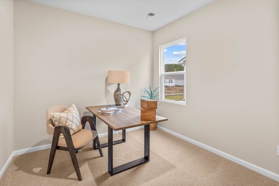 Representative furnished interior of a home built from the The Primrose by Chesapeake Homes in Coastal Club of the Carolinas, Calabash (Image 6).