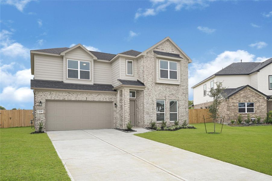 Front exterior of a new home in Rollingbrook Estates, Baytown, TX, highlighting curb appeal (Image 2). Front exterior of a new home in Rollingbrook Estates, Baytown, TX, highlighting curb appeal (Image 2).