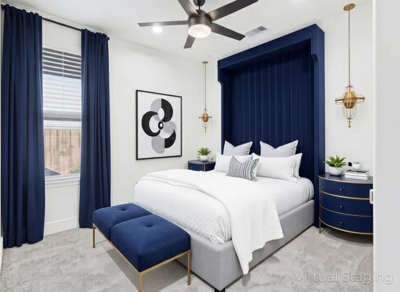 Bedroom with light colored carpet, a ceiling fan, and recessed lighting Bedroom with light colored carpet, a ceiling fan, and recessed lighting