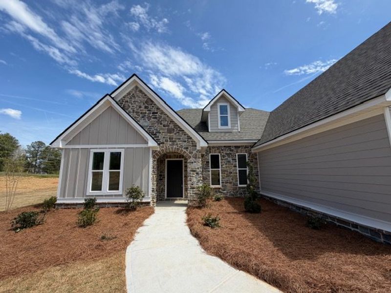 Front exterior of a new home in Hwy 16 South - Carrollton, Carrollton, GA, highlighting curb appeal (Image 6). Front exterior of a new home in Hwy 16 South - Carrollton, Carrollton, GA, highlighting curb appeal (Image 6).