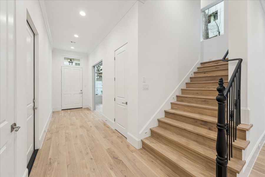 Thoughtful features, such as wrought iron stairway detail and LED integrated recessed lighting along the stairs can be found throughout the home and the community.