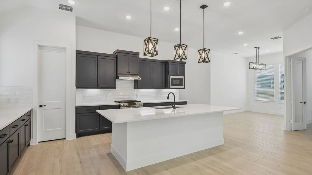 Furnished interior view inside a new home in Artavia, Conroe (Image 10).