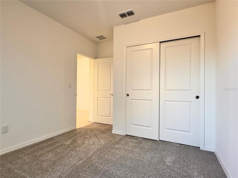 Spacious, unfurnished interior of a new home in Parkside Trails, Clermont (Image 27).